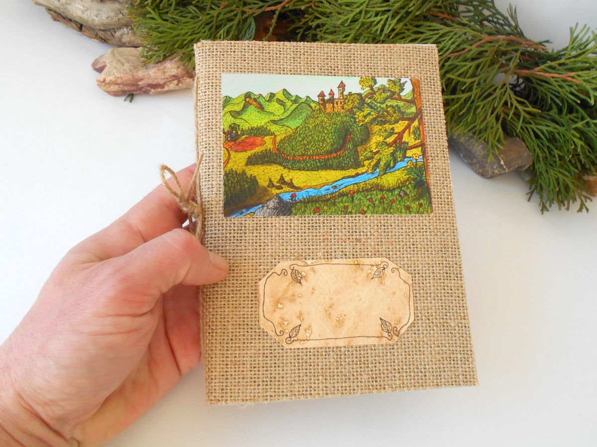 This fabric notebook with soft covers is made from a material I call &#39;&#39;Fabricpaper&#39;&#39;. The material I make myself as I glue the fabric with eco-friendly adhesive onto a colorful crafting cardstock with 105 lbs. The fabric is 100% natural burlap fabric produced in Bulgaria and is strong and fine for crafting books.