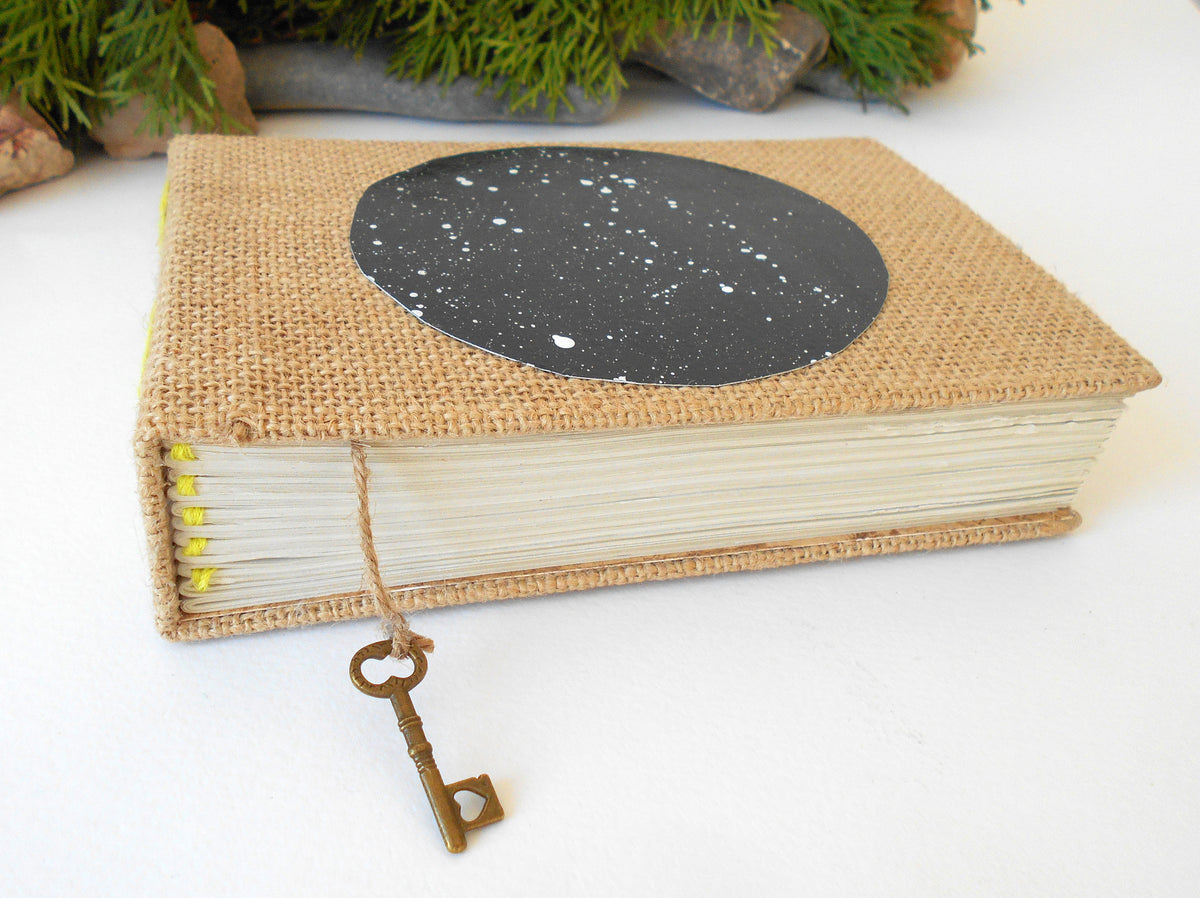  Travel sketchbook with hardcovers and 100% recycled pages and a star sky hand-painted acrylic art circle that I made. It can be used as a wedding book for a rustic wedding.
