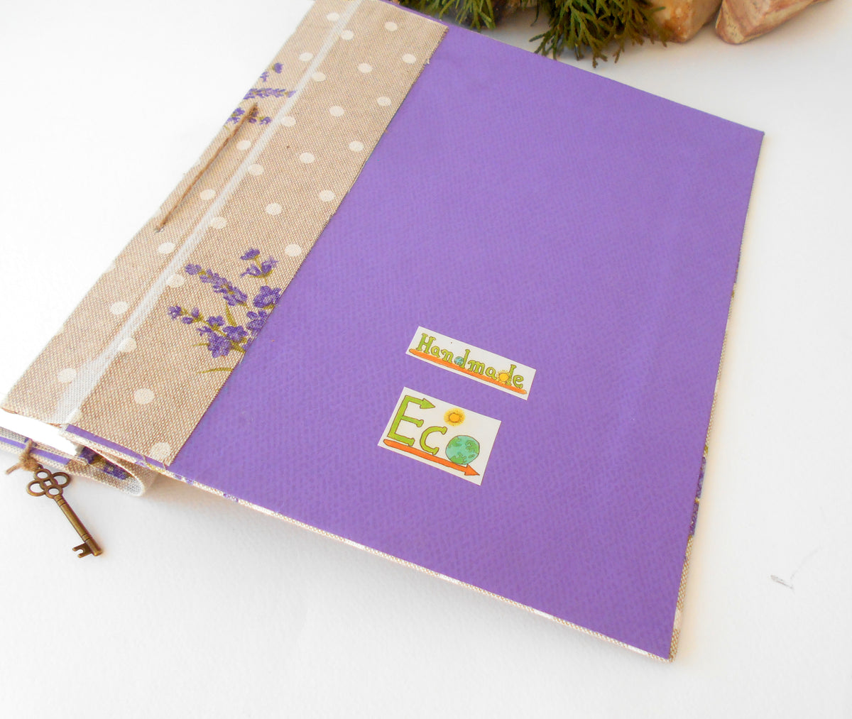 This is a unique personalized travel journal with hardcovers wrapped in a Cotton Lavender fabric covering. This refillable blank journal is made with watercolor card stock that is 105 Lbs. thick ( 250 gsm. ). You can unwrap the twine cord and put new page sheets. when you write off the pages.  On the inside of the front cover, I have crafted also a Lavender fabric pocket where you can put some notes, pictures, or other small objects.