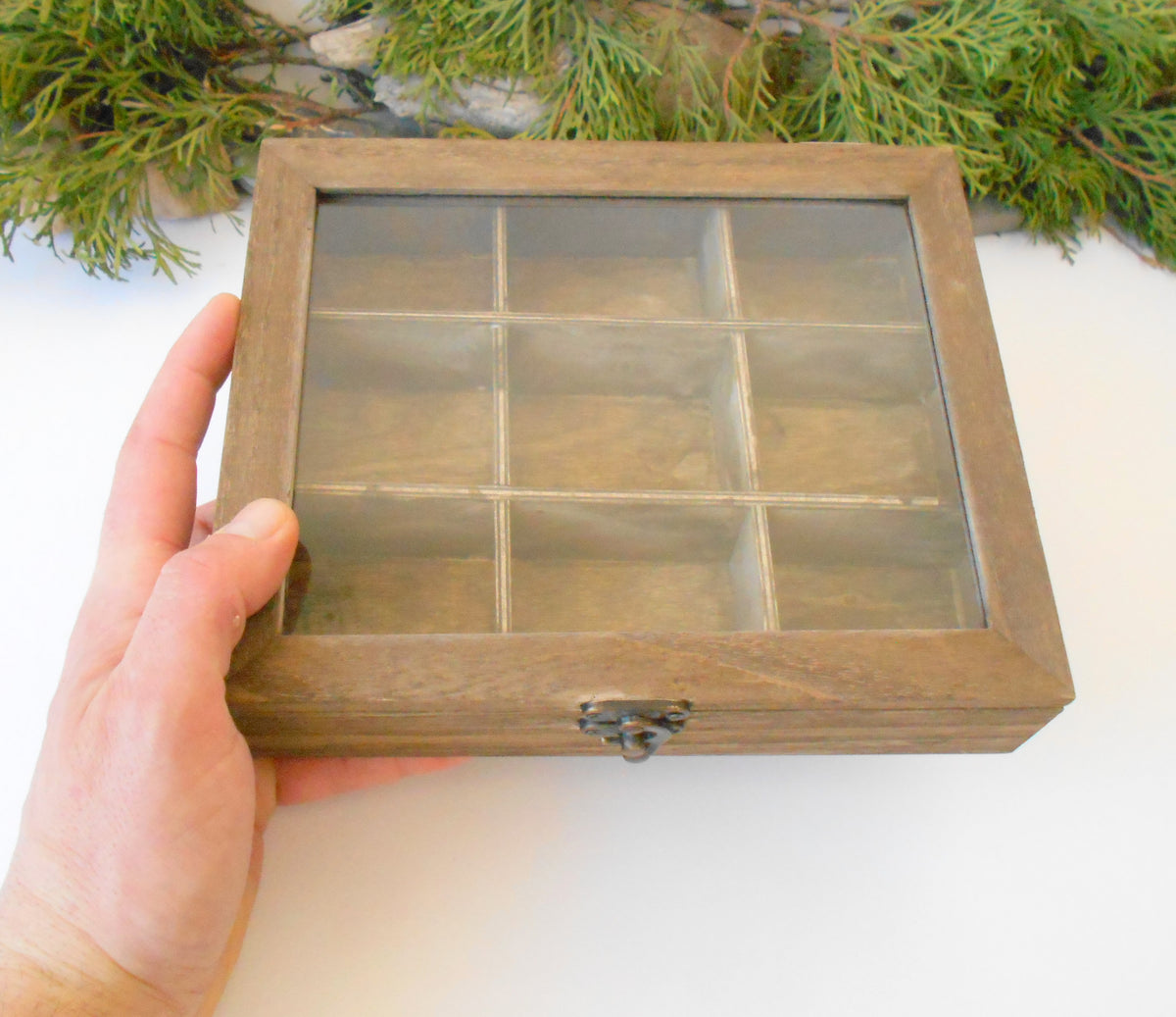 This is a wooden box with a glass display that is made of bamboo wood and that has metal hinges and closes with a bronze-color closing that may display various things like jewelry, miniatures, crystals, or other small objects of importance to you or your friends. &lt;span data-mce-fragment=&quot;1&quot;&gt;I have colored the box with mordant so that it looks like an old wood vintage box with a mahogany color.&lt;/span&gt;