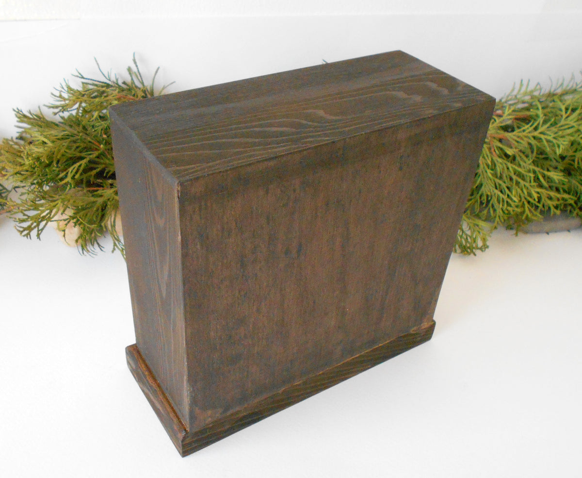 This wooden box with 7 drawers is made of pinewood. It has metal pulls with a vintage bronze color. The surface of the box is smooth and refined with sanding paper. &lt;span data-mce-fragment=&quot;1&quot;&gt;I have colored the box with mordant so that it looks like an old wood vintage box with a mahogany color.&lt;/span&gt;