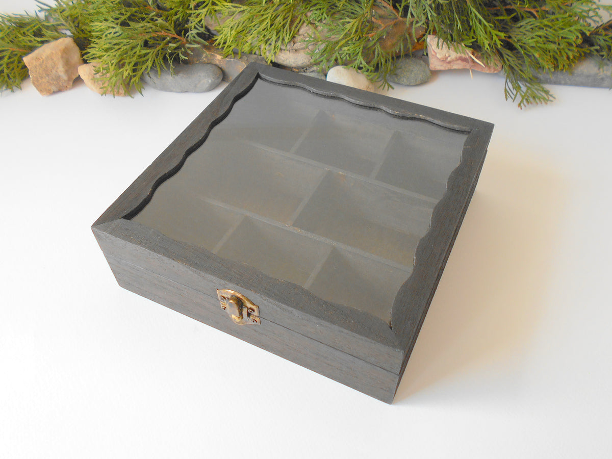 This is a wooden box with a glass display that is made of bamboo wood and that has metal hinges and closes with a bronze-color closing that may display various things like jewelry, miniatures, crystals, or other small objects of importance to you or your friends.&lt;br data-mce-fragment=&quot;1&quot;&gt;&lt;span data-mce-fragment=&quot;1&quot;&gt;I have colored the box with mordant so that it looks like an old wood vintage box with a dark brown color.&lt;/span&gt;