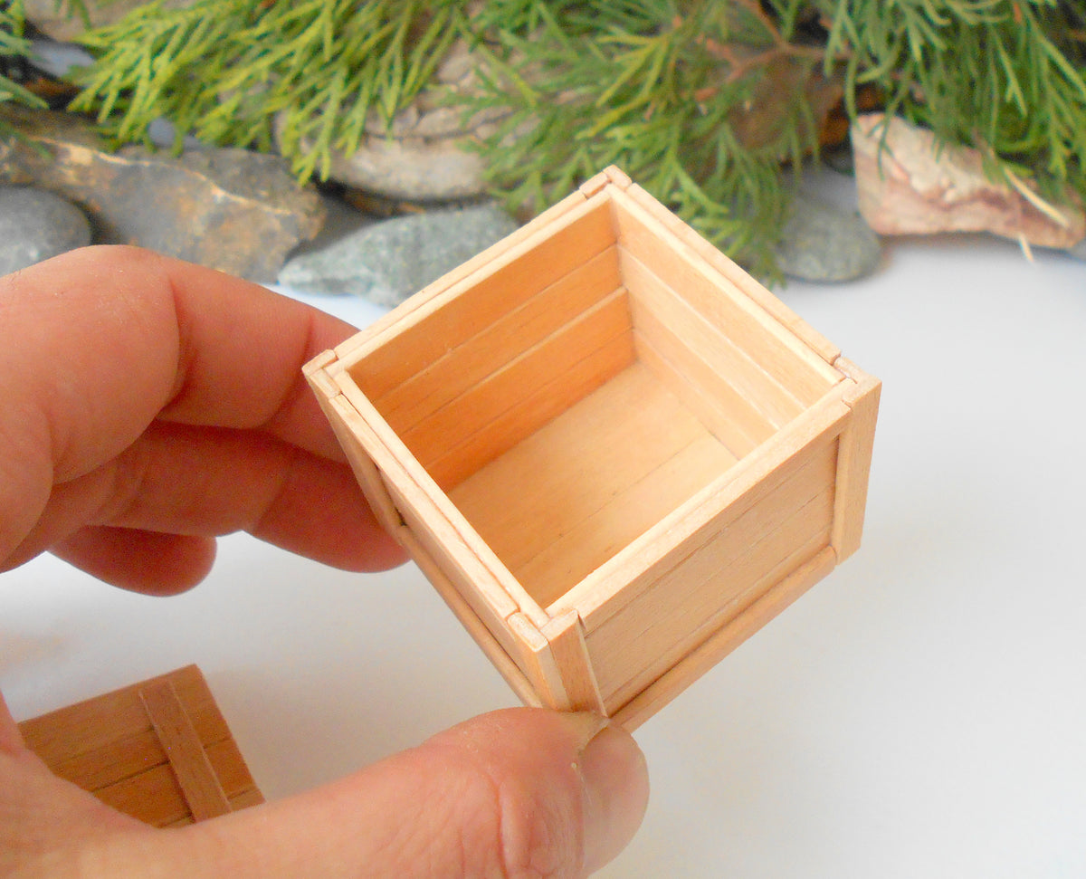 This is a miniature transporting box coffer that is approximately 1/12 in scale.
