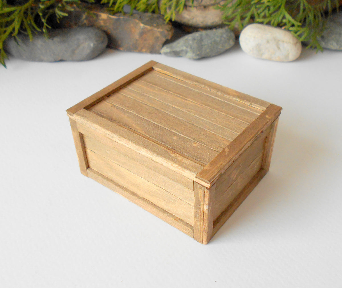 This is a miniature transporting box coffer that is approximately 1/12 in scale. The box coffer has 3 wooden boards in height and four boards in width on each side.&lt;br data-mce-fragment=&quot;1&quot;&gt;This is a listing to purchase one such miniature box like the one you see from the pictures. I have stained the box in light brown with an Italian eco-friendly mordant.&amp;nbsp;
