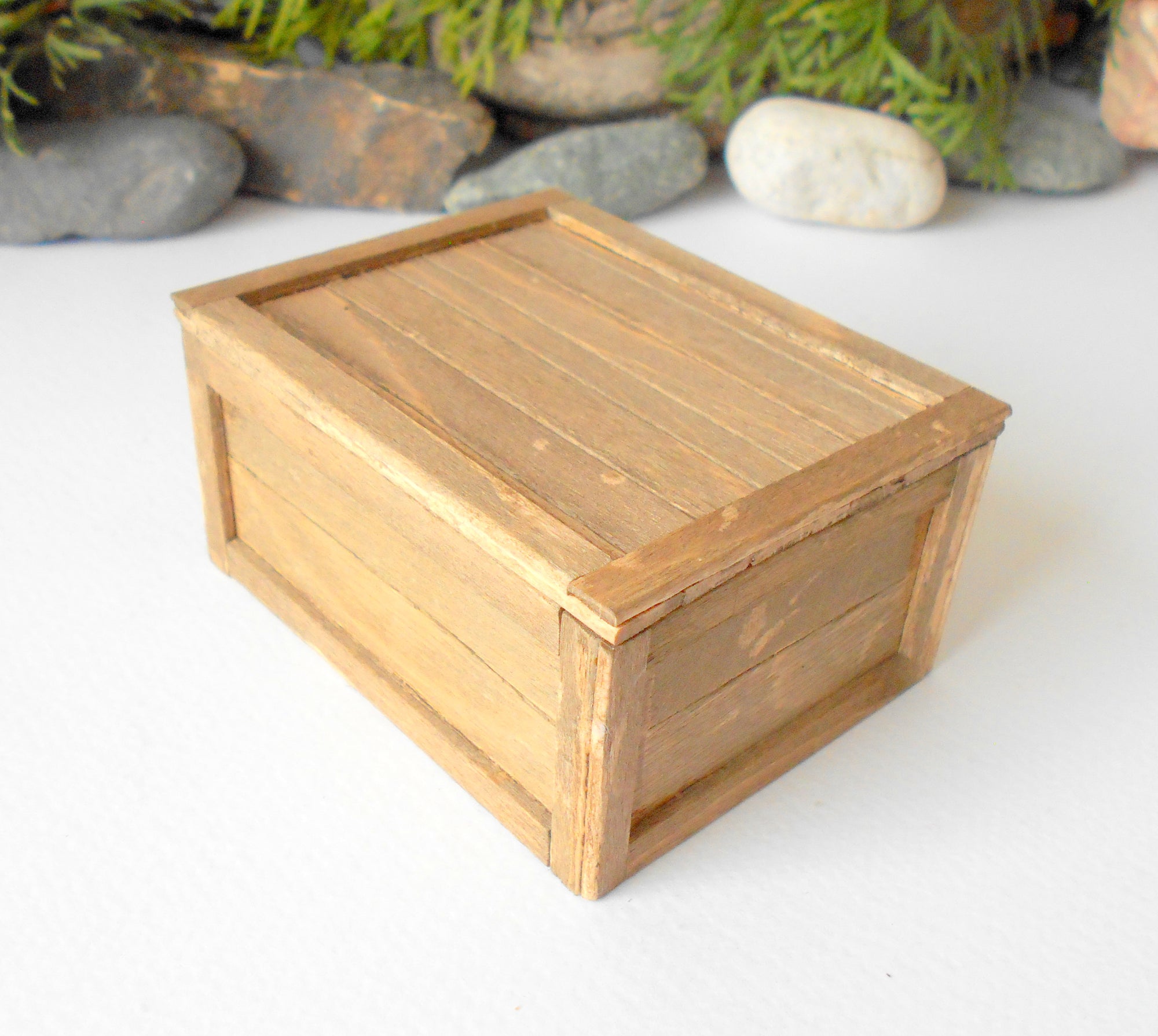 This is a miniature transporting box coffer that is approximately 1/12 in scale. The box coffer has 3 wooden boards in height and four boards in width on each side.<br data-mce-fragment="1">This is a listing to purchase one such miniature box like the one you see from the pictures. I have stained the box in light brown with an Italian eco-friendly mordant.&nbsp;