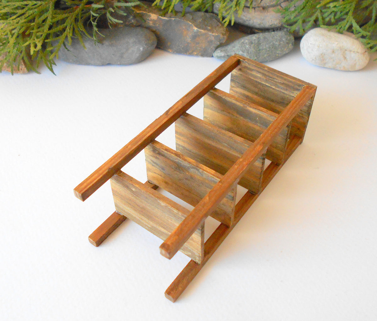 This is a Miniature shelf of wooden furniture that is approximately 1/12 in scale. I have stained the shelf with light brown Italian eco-friendly mordant.&amp;nbsp;