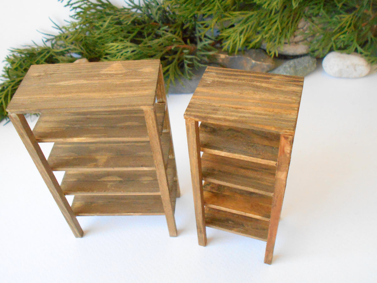 &lt;p&gt;This is a set of 2 miniature shelves of wooden furniture that is approximately 1/12 in scale&lt;strong&gt;. &lt;/strong&gt;I have stained the shelves with light brown Italian eco-friendly mordant.&amp;nbsp;&lt;/p&gt; &lt;p&gt;This is a listing to purchase one such set of small and big shelf like the set you see in the pictures. You will receive one big and one small shelf. See sizes below.&lt;br data-mce-fragment=&quot;1&quot;&gt;This mini&amp;nbsp;rack is crafted with eco-friendly glue and&amp;nbsp;pine wood fine and smoothed sticks.&lt;/p&gt;