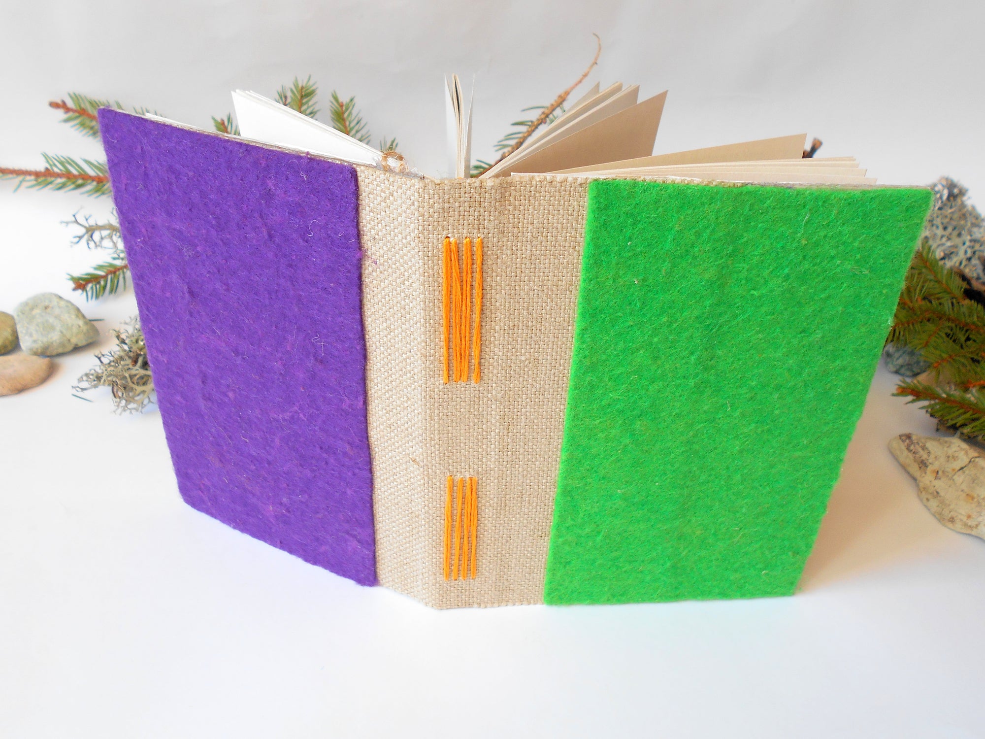 Handmade fabric and felt hardcover journal with linen fabric and green and purple felt covers with orange bookbinding and hardspine by ExiArts from Bulgaria.