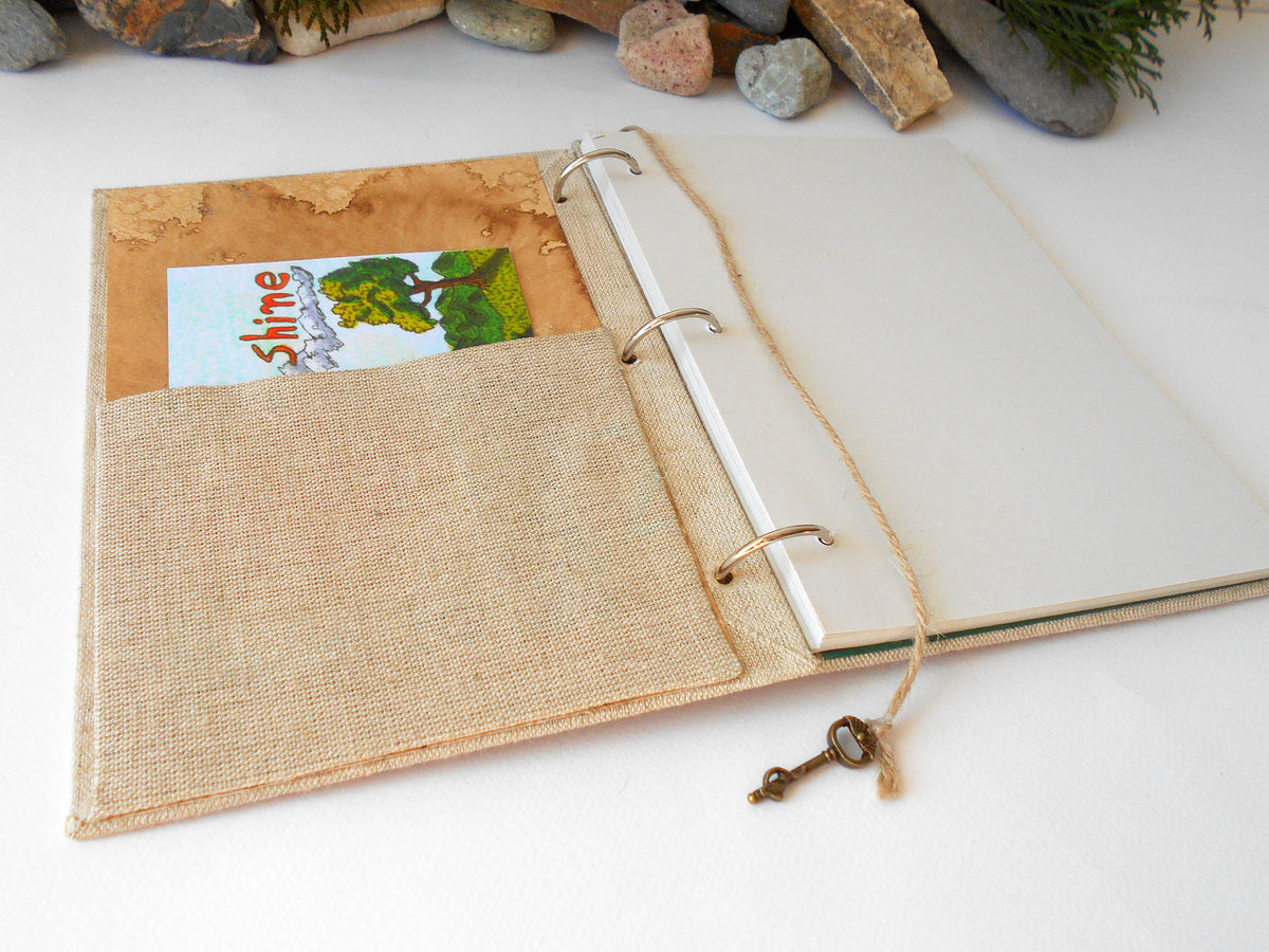 Handmade refillable fabric journal with a Tree Art on the cover and a pocket on the inside- 100% recycled pages- 54 lbs.- 80 gsm