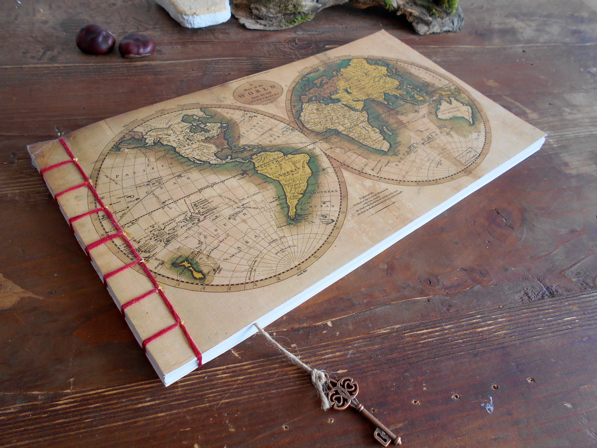 Products Map sketchbook journal with a World Map fine print cover- 100% recycled papers-coffee stained back cover- key bookmark