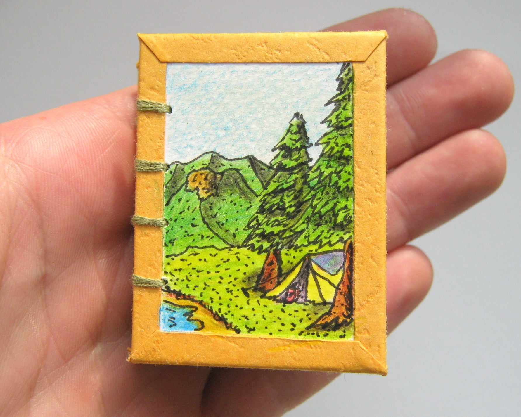 
          
            One the first mini journal designs I crafted when I created ExiArts back in 2013. A journal for people who love nature and camping.
          
        