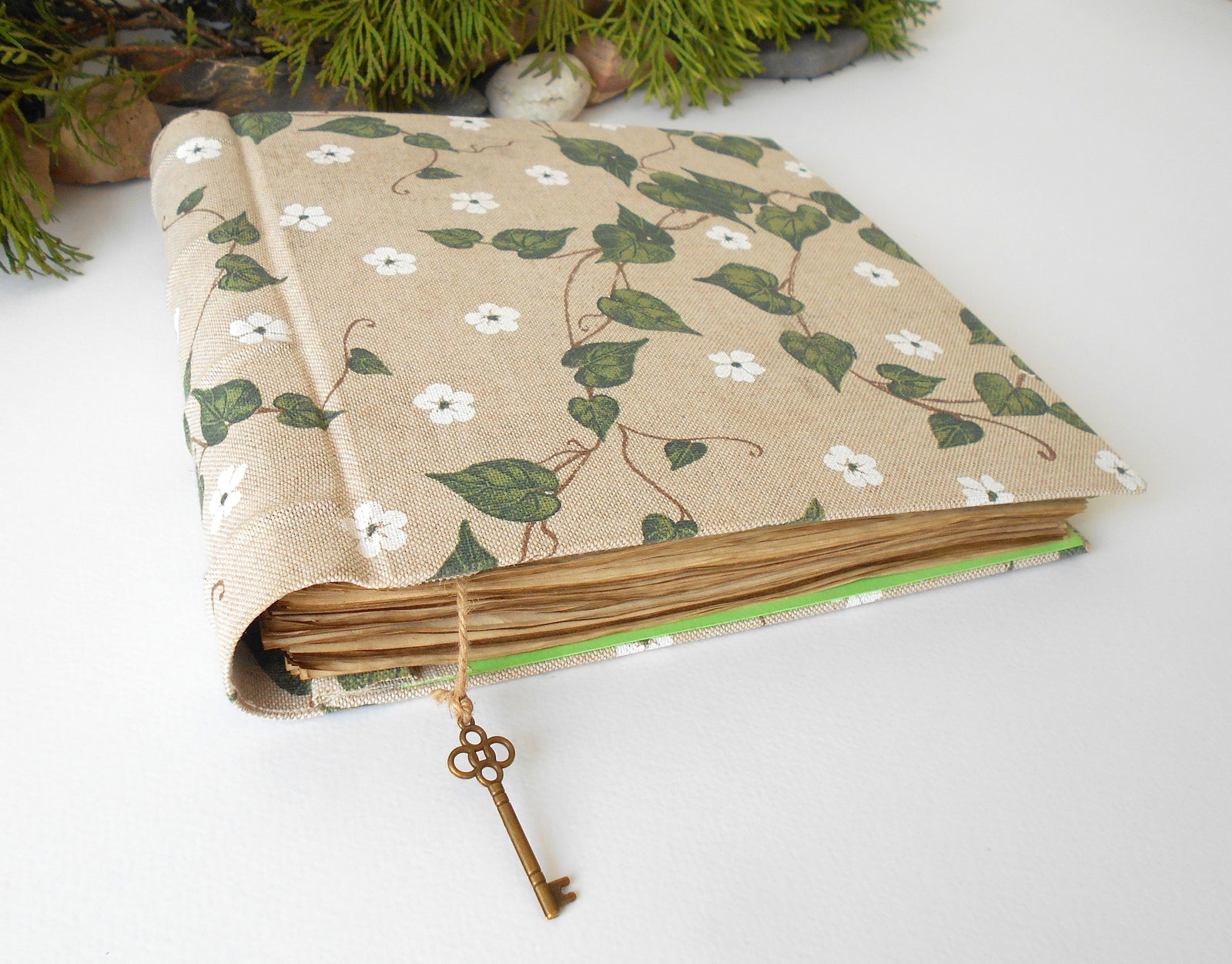 This is a unique inspirational personalized travel journal with hardcovers wrapped in a linen fabric covering. This refillable blank journal is made with 100% recycled page sheets in 80 gsm. paper which is 54 lbs thick. I have coffee-stained the pages so that they look old and vintage.