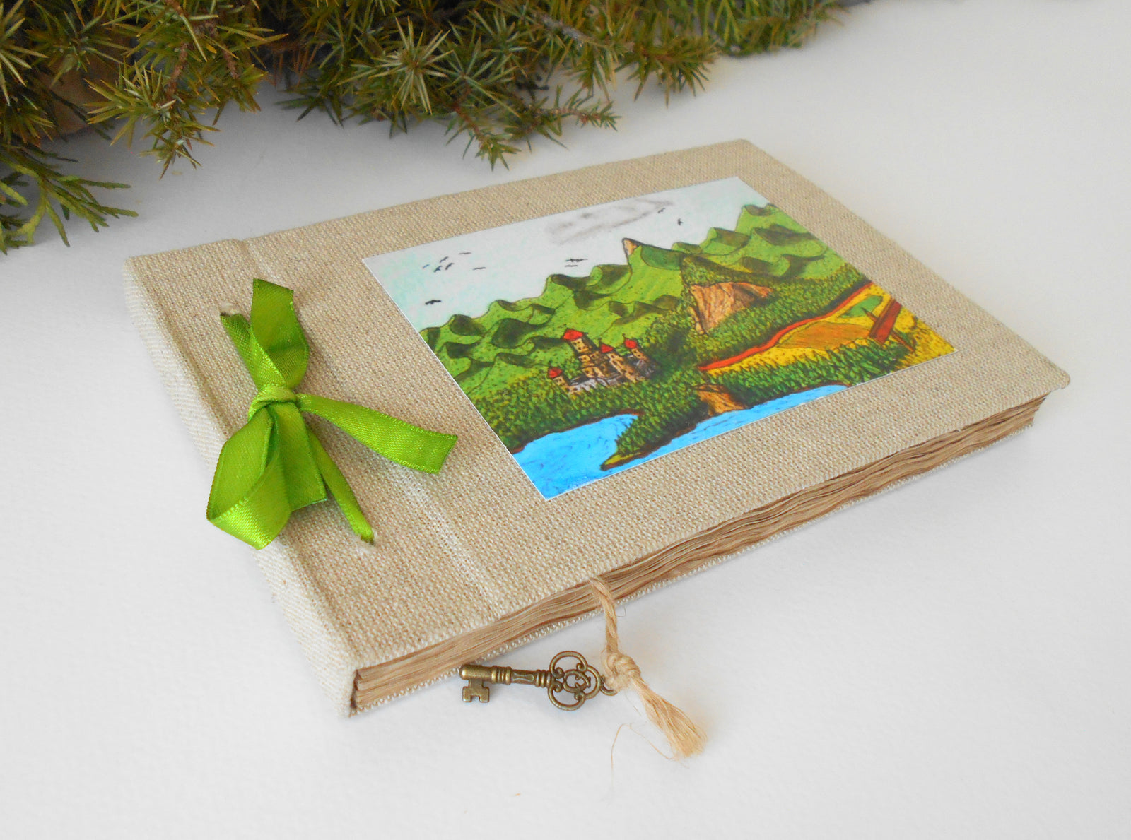 <p>This is a refillable fabric sketchbook journal with a lash-down satin ribbon&nbsp;binding. You can personalize the color of this ribbon and the inside cover lining too. Read below for more information.</p> <p><span>On the sketchbook cover, I have strongly glued with eco-friendly adhesive one of my art prints&nbsp;on a high-quality archival card stock.</span></p>