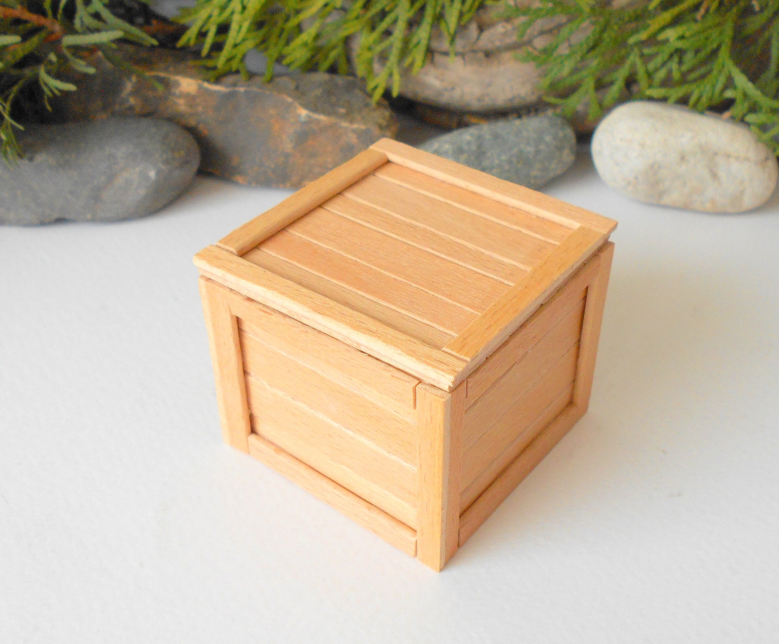 This is a miniature transporting box coffer that is approximately 1/12 in scale.