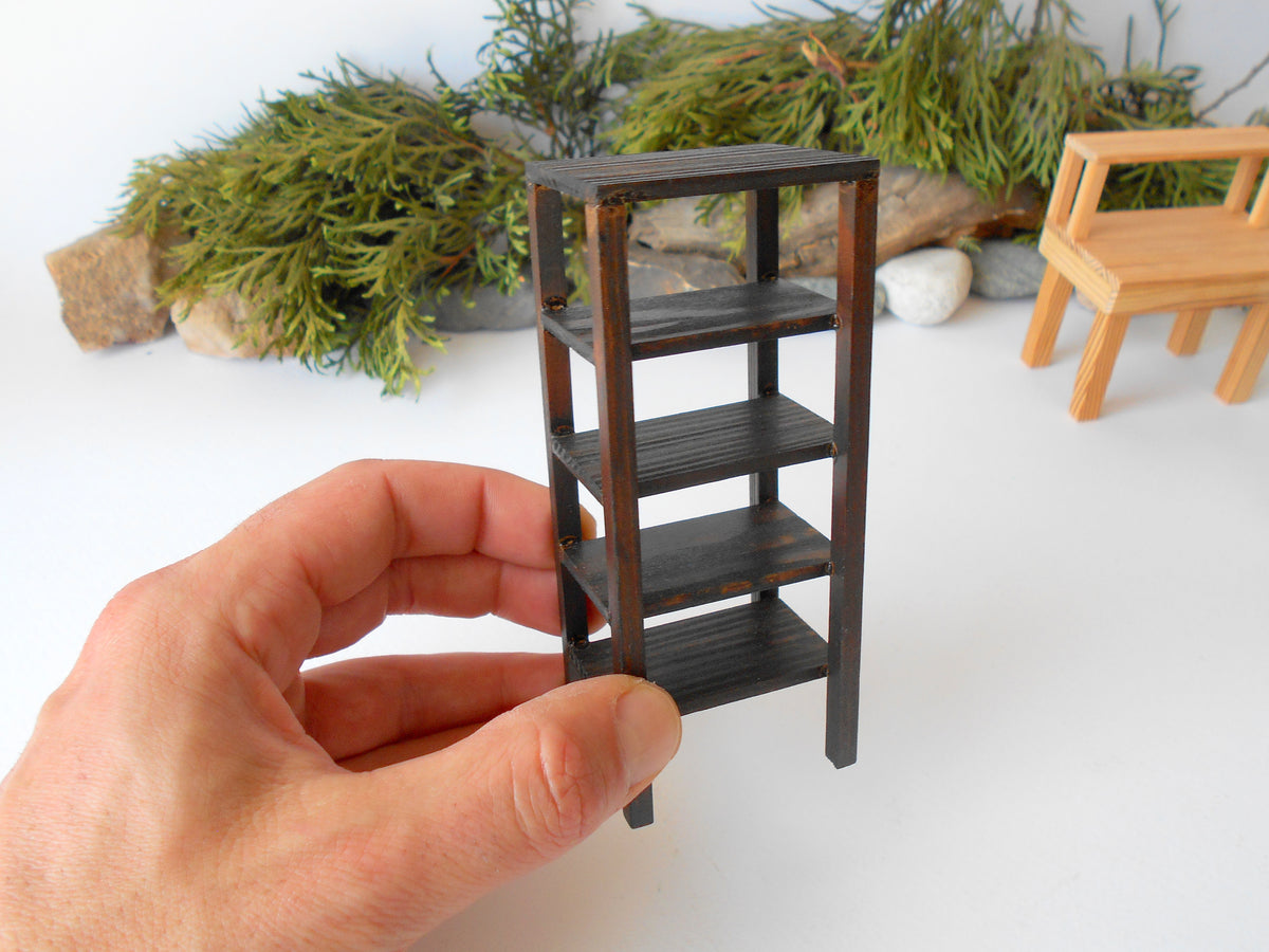 This is a Miniature shelf of wooden furniture that is approximately 1/12 in scale. I have stained the shelf with dark brown Italian eco-friendly mordant.&amp;nbsp;  This is a listing to purchase one such shelf like the one you see in the pictures. This mini&amp;nbsp;rack is crafted with eco-friendly glue and&amp;nbsp;pine wood fine and smoothed sticks.