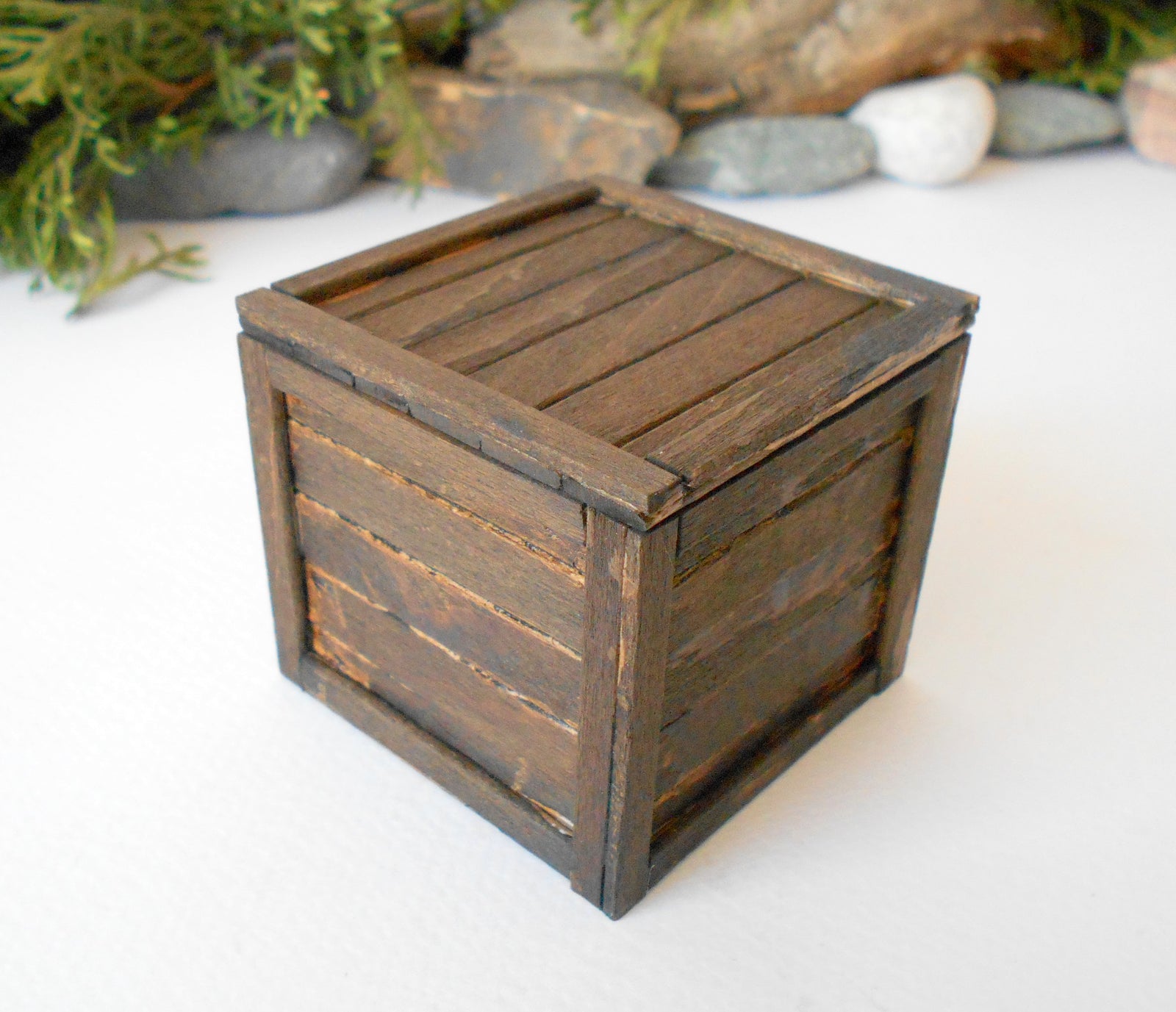 This is a miniature transporting box coffer that is approximately 1/12 in scale. The box coffer I have crafted from reclaimed beech wood popsicle sticks that I saved from the landfill.