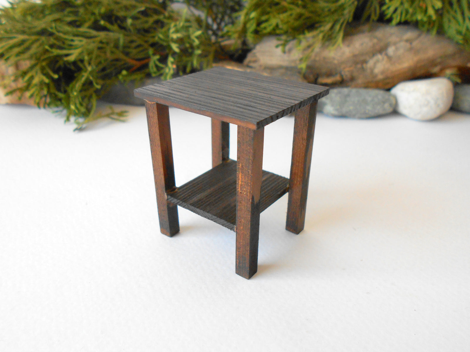 This is a Miniature&nbsp;nightstand or plant stand table of wooden furniture that is approximately 1/12 in scale. I have stained the mini nightstand with an Italian eco-friendly mordant in dark brown.