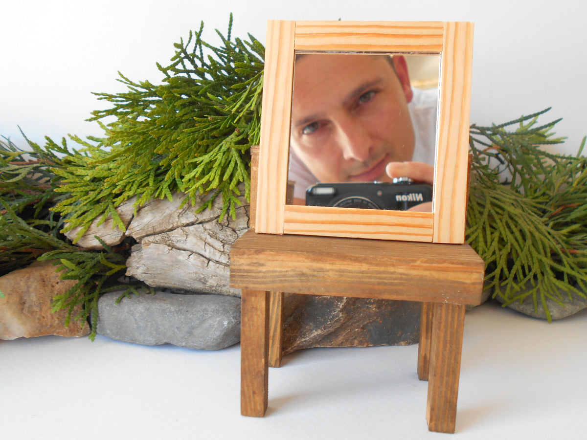 This is a miniature mirror framed with real pinewood that can decorate your dollhouse projects or your architectural models. If you know a passionate collector of miniatures you can make him or her a gift with one tiny framed mirror from an independent artist.  1/12th scale.  Size: 27&#39;&#39; x 2.9&#39;&#39;- 7 x&amp;nbsp; 7.5 cm.  Thickness: 0.15&#39;&#39; which is 0.4 cm.