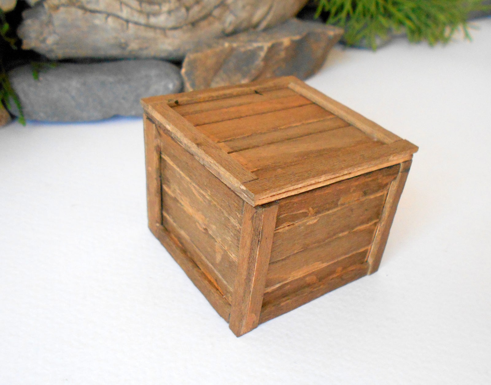 This is a miniature transporting box coffer that is approximately 1/12 in scale. The box coffer I have crafted from reclaimed beech wood popsicle sticks that I saved from the landfill.