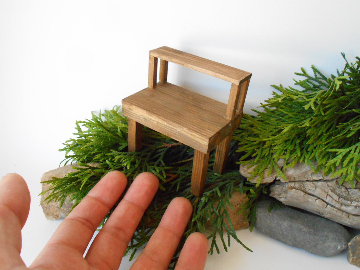 This is a handmade miniature wooden gardening table for miniature dollhouse conservatories on a 1/12th scale. I handmade this table on order with real pine wood boards and beams and with water-based eco-friendly glue. The table has mini shelving on the top desk to have more space for mini planters or mini gardening tools.