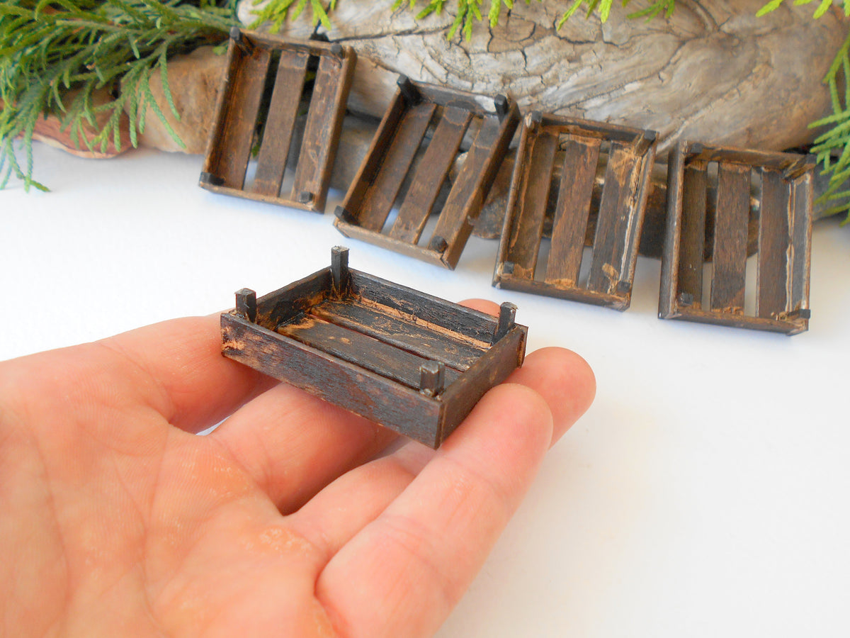 This is a set of 5 ( five ) handmade Dollhouse miniature wooden crates that are&amp;nbsp;1/12th in scale that I have crafted from reclaimed beech wood popsicle stick that I save from the landfill.