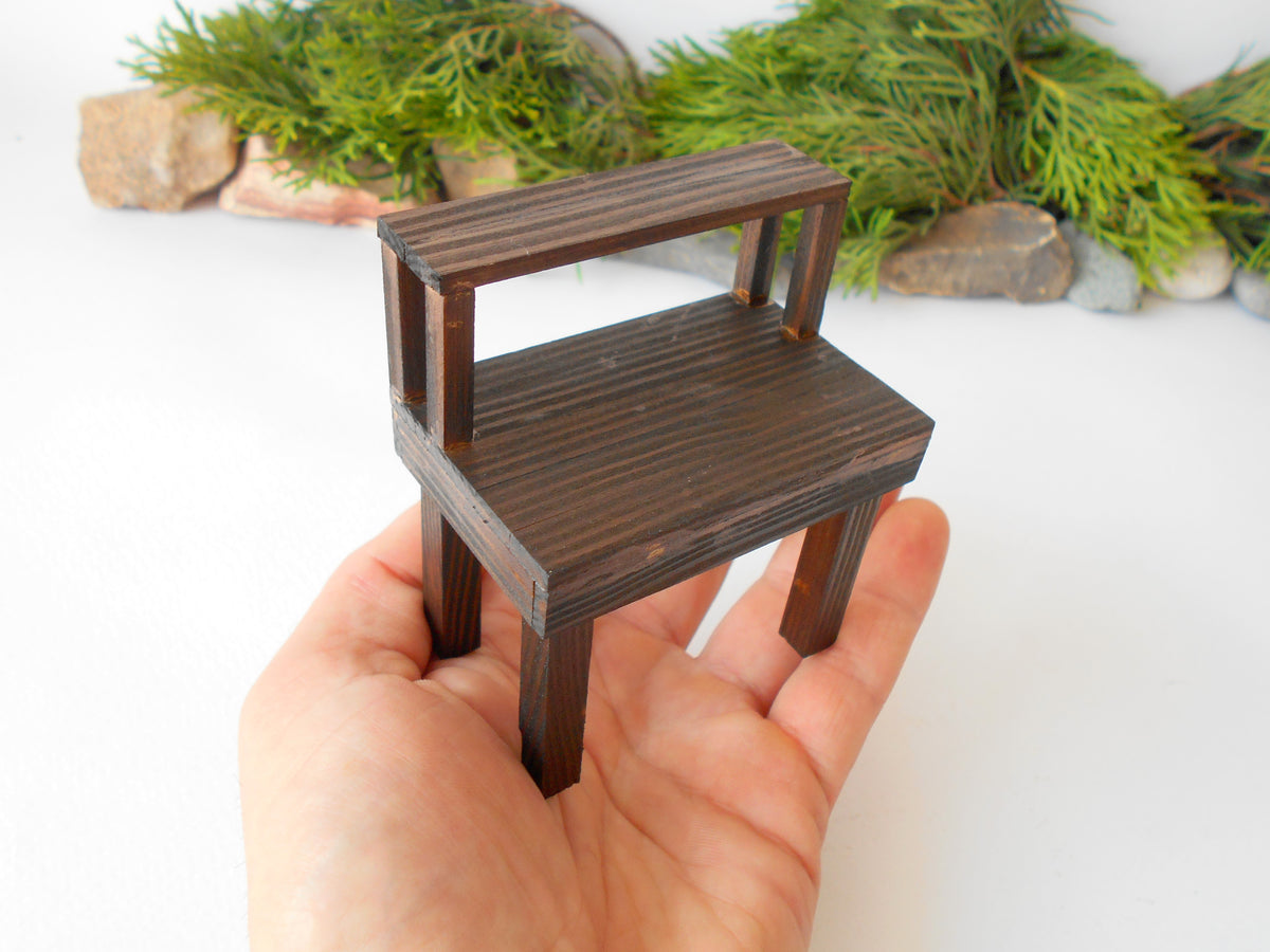 This is a handmade miniature wooden gardening table for miniature dollhouse conservatories on a 1/12th scale. I handmade this table on order with real pine wood boards and beams and with water-based eco-friendly glue. The table has mini shelving on the top desk to have more space for mini planters or mini gardening tools.