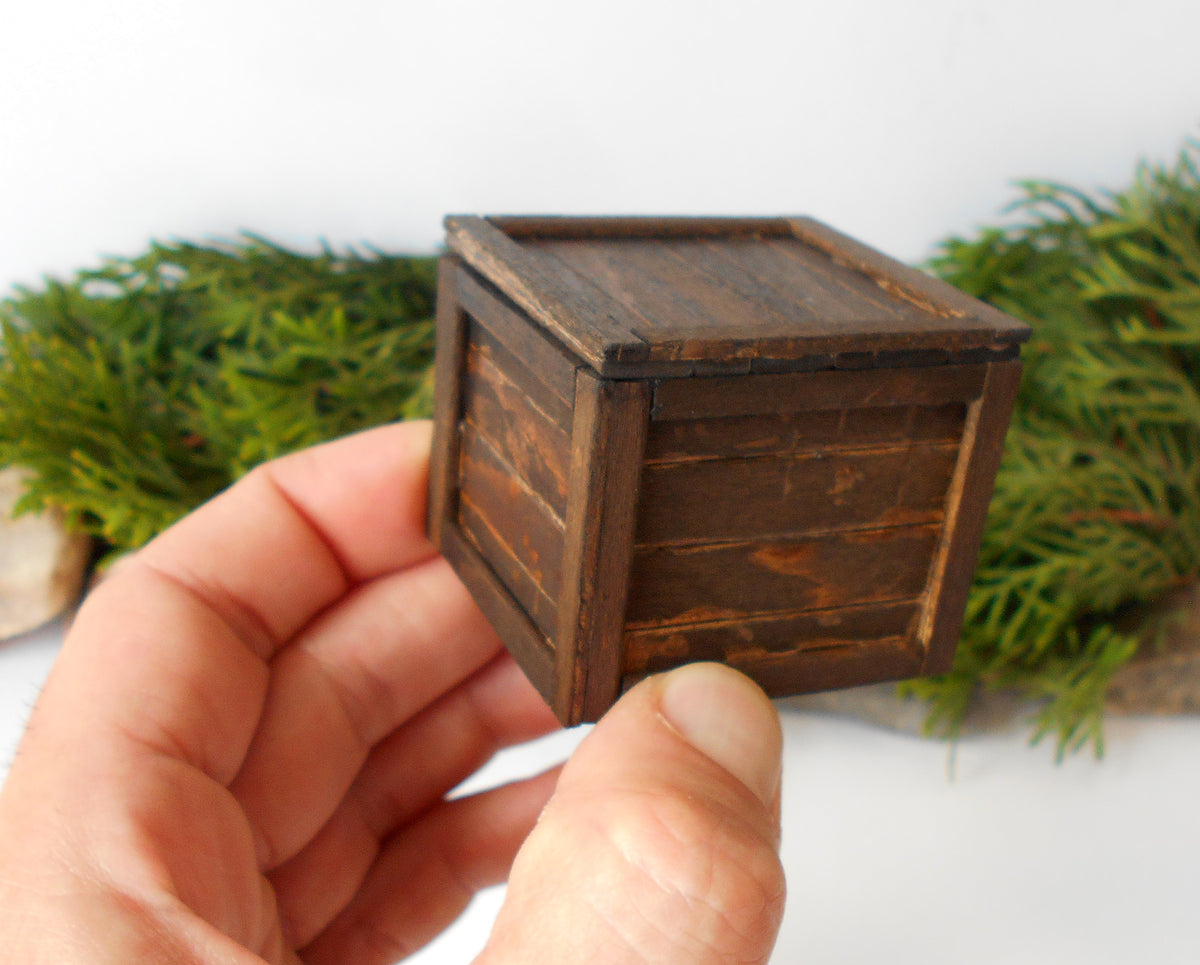 This is a miniature transporting box coffer that is approximately 1/12 in scale. The box coffer I have crafted from reclaimed beech wood popsicle sticks that I saved from the landfill.