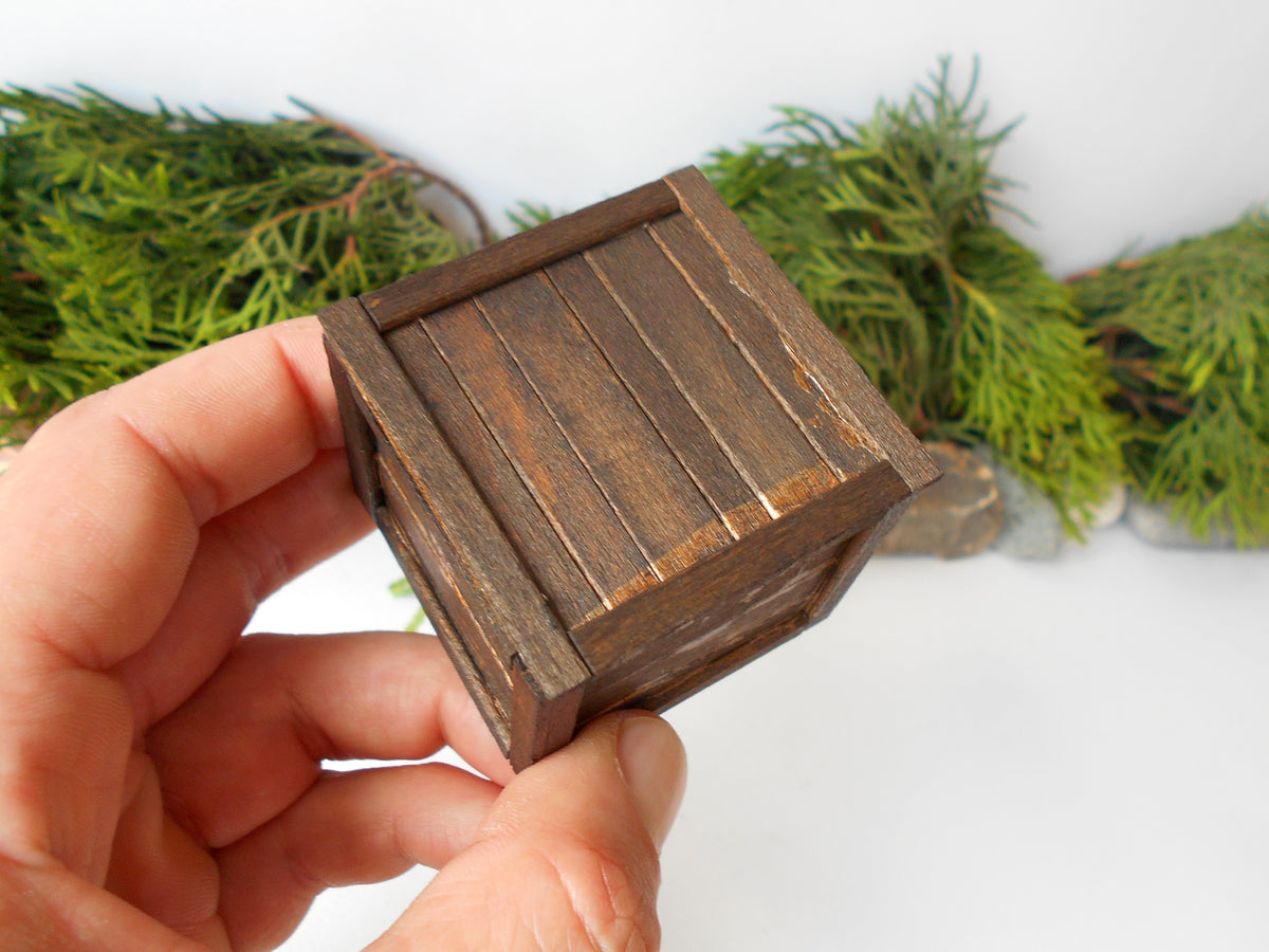 This is a miniature transporting box coffer that is approximately 1/12 in scale. The box coffer I have crafted from reclaimed beech wood popsicle sticks that I saved from the landfill.