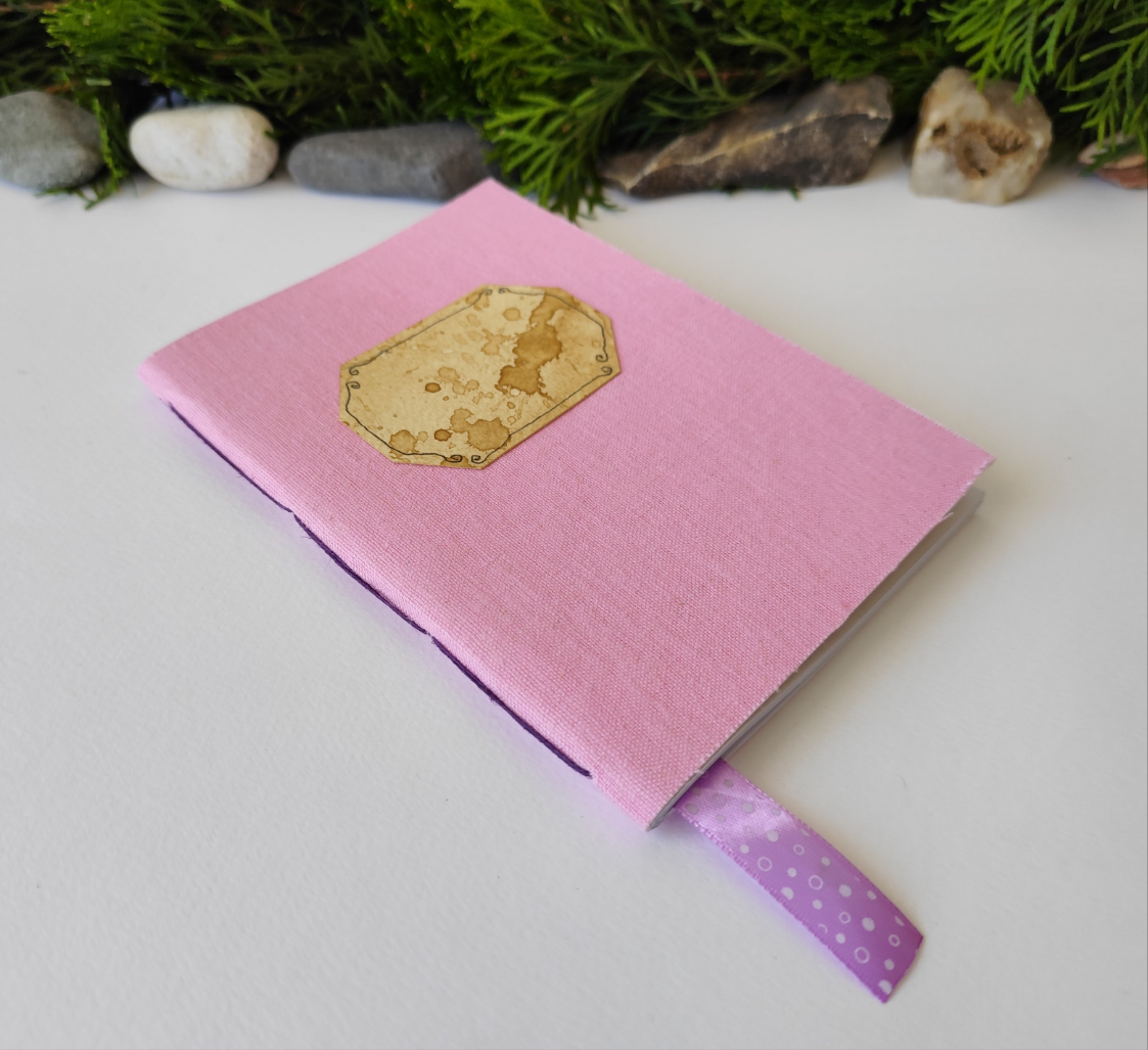 Pink handmade fabric notebook with a title label, a bookmark, Hemp Cord binding and coffee inside lining- 5&quot; x 7&quot; ( 12.5 x 17.5 cm. )