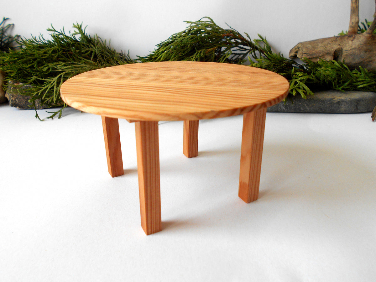 The height of the table is 2.5 inches and it is 4.5 inches diameter. This is 11.4 cm. diameter and 6.4 cm. height. This product listing is for one sush table.