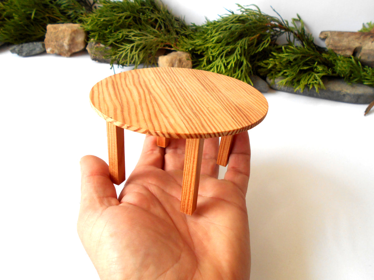 The height of the table is 2.5 inches and it is 4.5 inches diameter. This is 11.4 cm. diameter and 6.4 cm. height. This product listing is for one sush table.