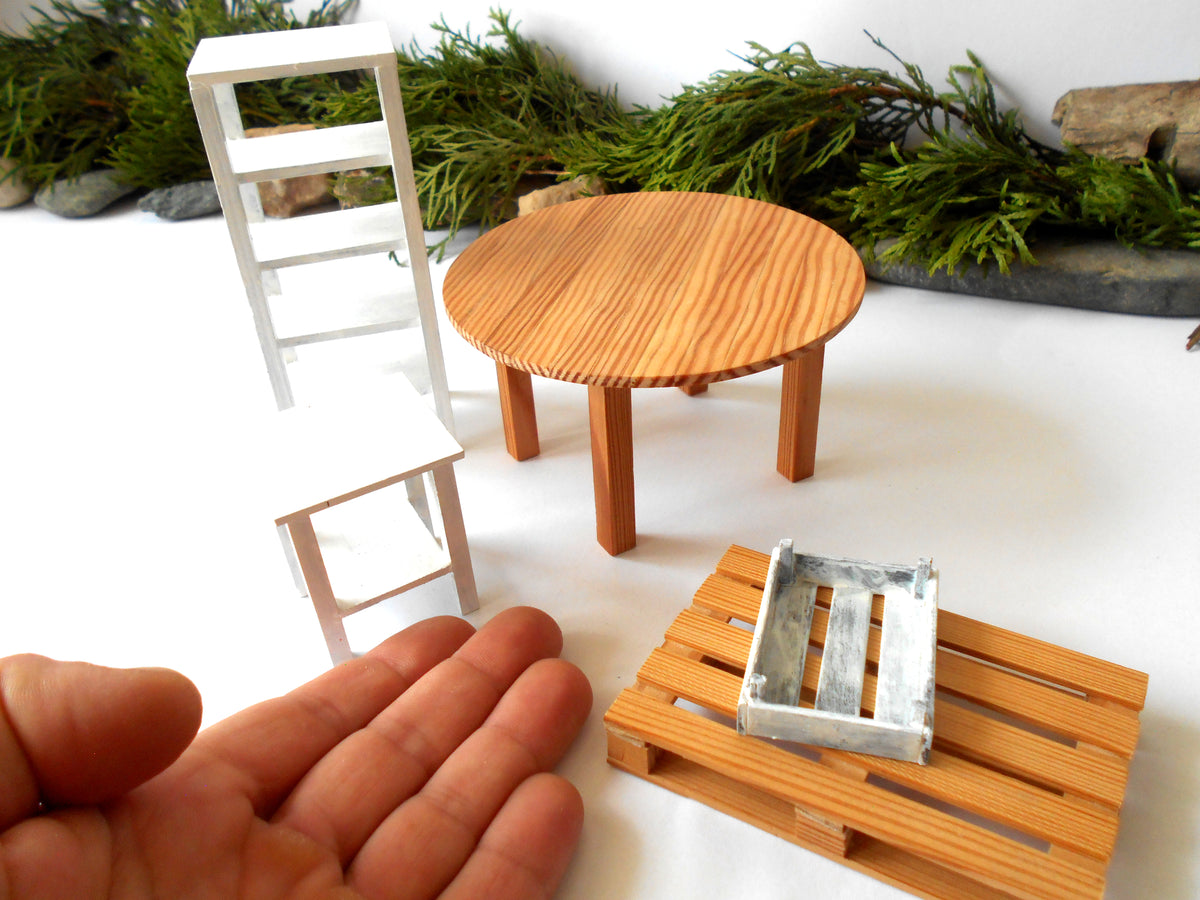 The height of the table is 2.5 inches and it is 4.5 inches diameter. This is 11.4 cm. diameter and 6.4 cm. height. This product listing is for one sush table.