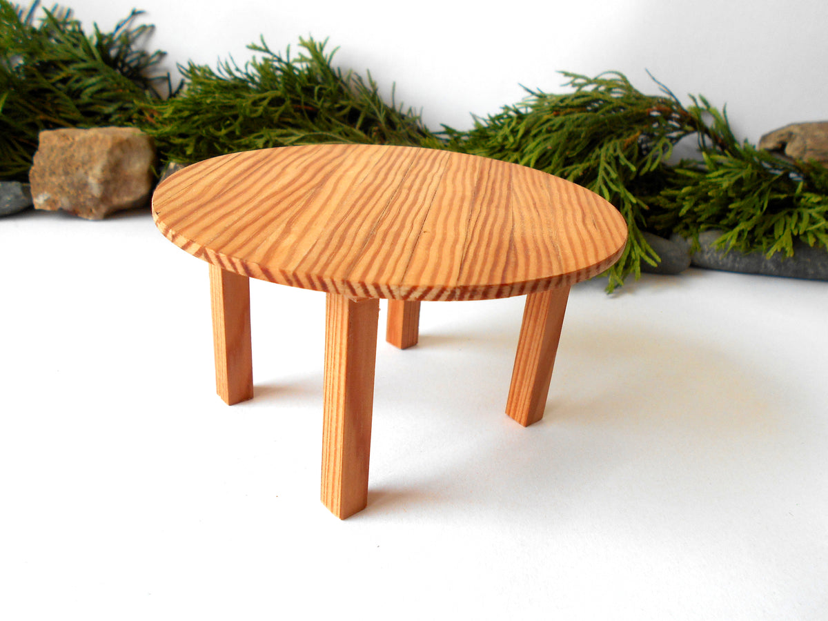 The height of the table is 2.5 inches and it is 4.5 inches diameter. This is 11.4 cm. diameter and 6.4 cm. height. This product listing is for one sush table.