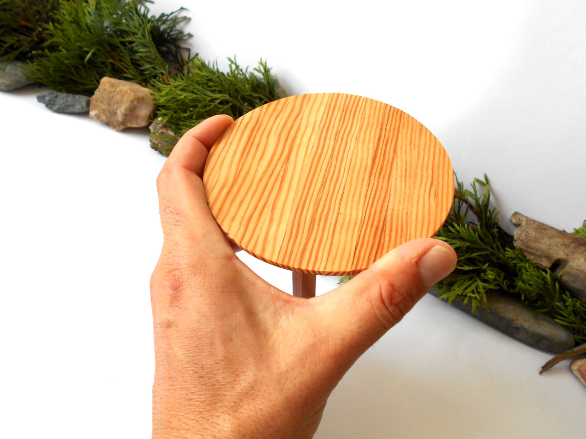 The height of the table is 2.5 inches and it is 4.5 inches diameter. This is 11.4 cm. diameter and 6.4 cm. height. This product listing is for one sush table.