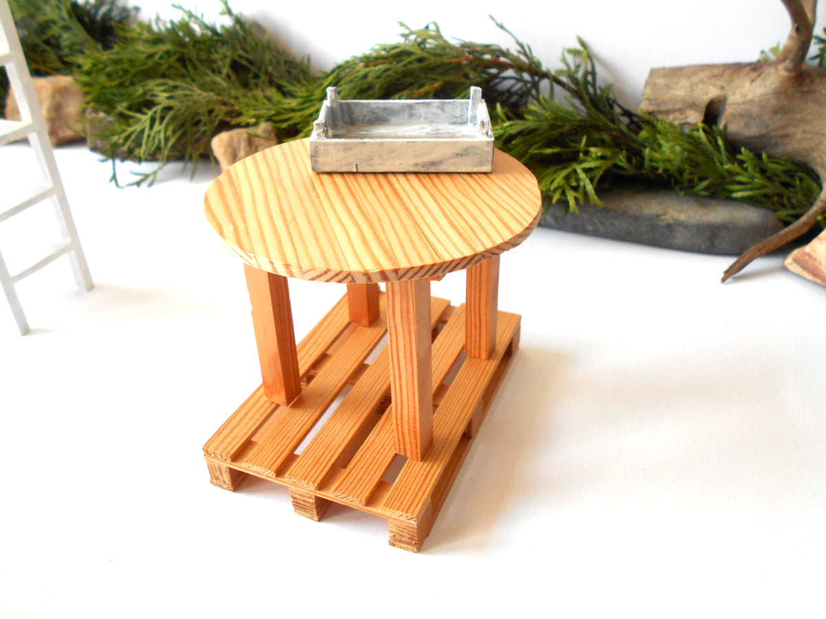 Handmade rustic round pine miniature table, 3.5" diameter, 1/12 scale. Ideal for dollhouses & fairy gardens. Eco-friendly, made in Bulgaria by ExiArts.