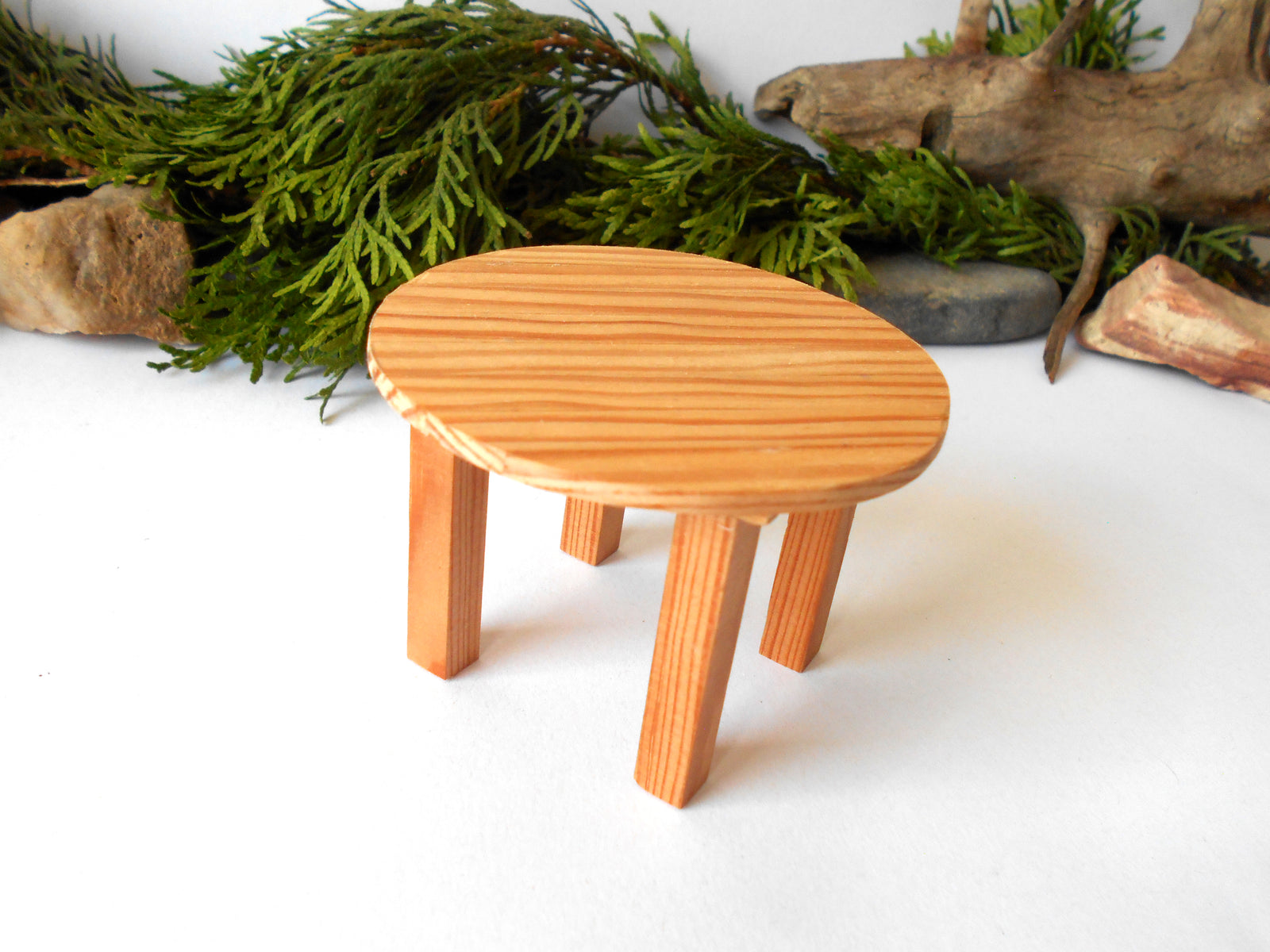 The height of the table is 2.5 inches, and it is 3.1 inches in diameter. This is 7.9 cm diameter and 6.4 cm in height. This product listing is for one sush table.