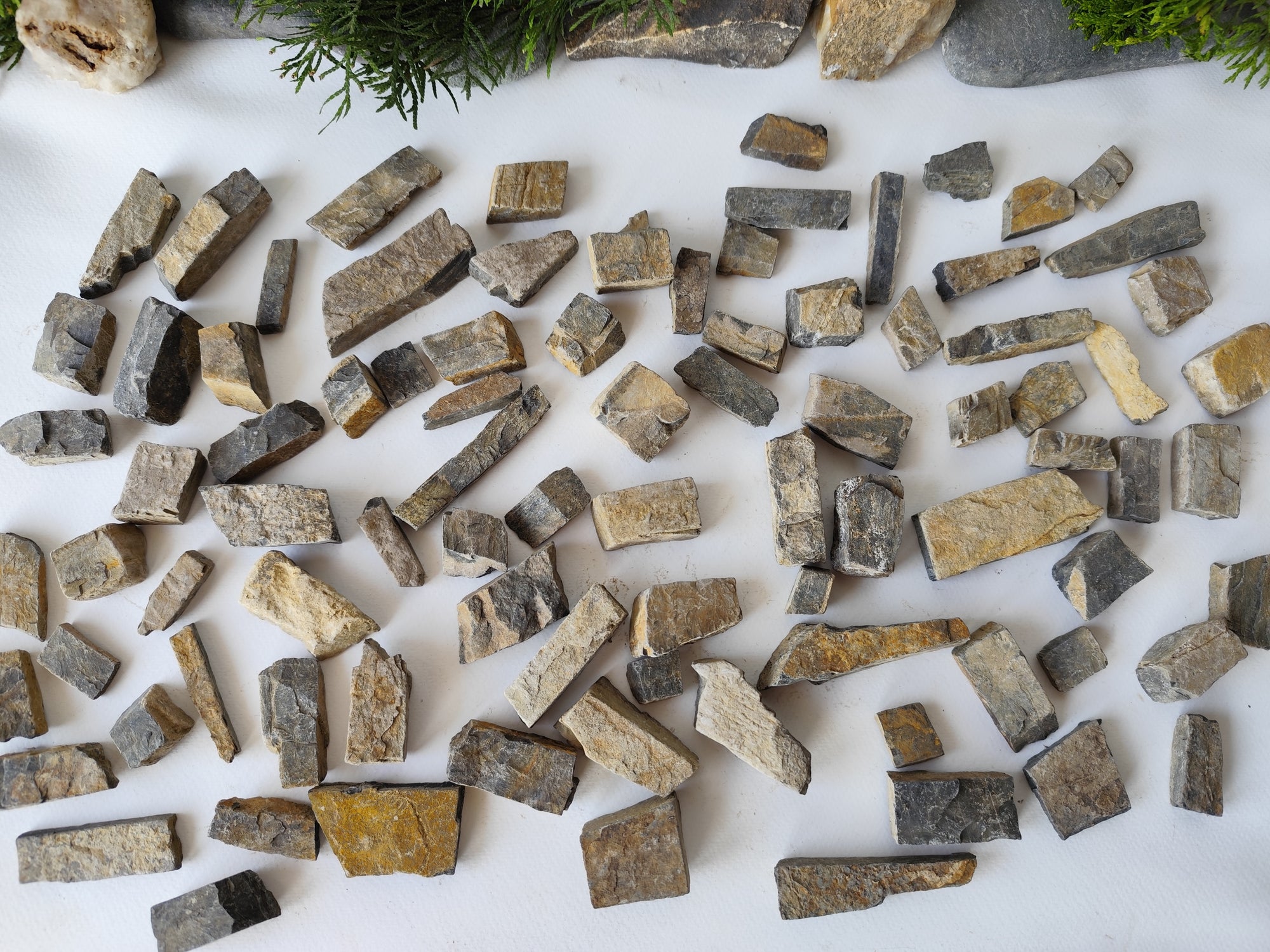 This is a Set of 100 Natural Stone Bricks Materials for Miniatures & Crafts - DIY Craft Supplies. I will make a selection specially for you of 100 such stones and I will make sure to include in the set 4 different types of stone bricks- squareish, rectangularish,  long and narrow like short beams and also plate like slate stones. Your set will have from all of the 4 types of stones.