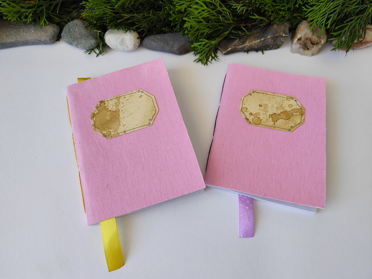Pink handmade fabric notebook with a title label, a bookmark, Hemp Cord binding and coffee inside lining- 5&quot; x 7&quot; ( 12.5 x 17.5 cm. )