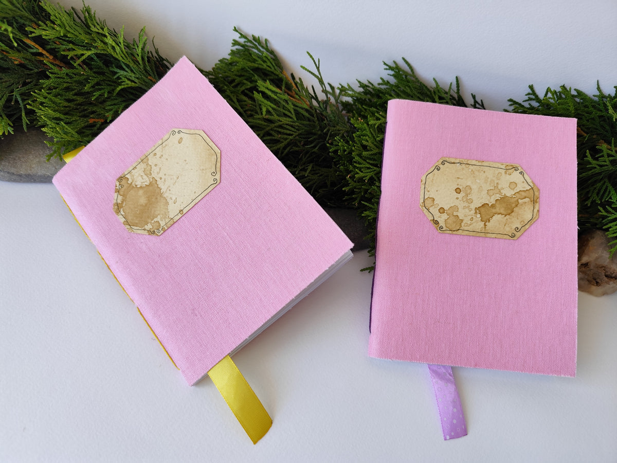 Pink handmade fabric notebook with a title label, a bookmark, Hemp Cord binding and coffee inside lining- 5&quot; x 7&quot; ( 12.5 x 17.5 cm. )